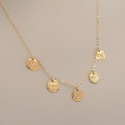 Gold five layered disc necklace