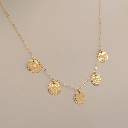 Gold five layered disc necklace